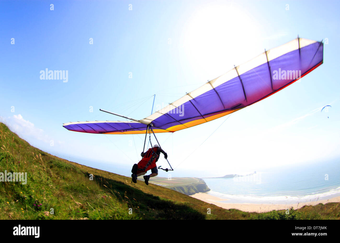 Hang glider taking off at Rhossili Downs on the Gower peninsula Wales