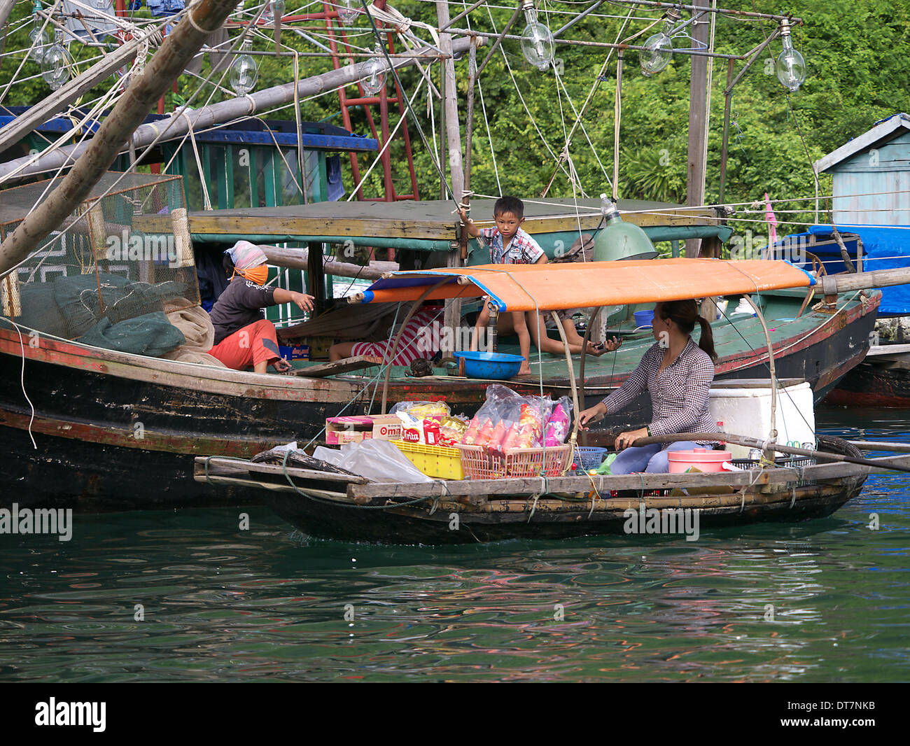 Shop on boat at floating village Vietnam Stock Photo - Alamy