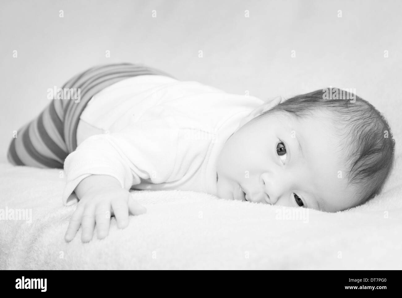 Small cute newborn baby black and white photo Stock Photo