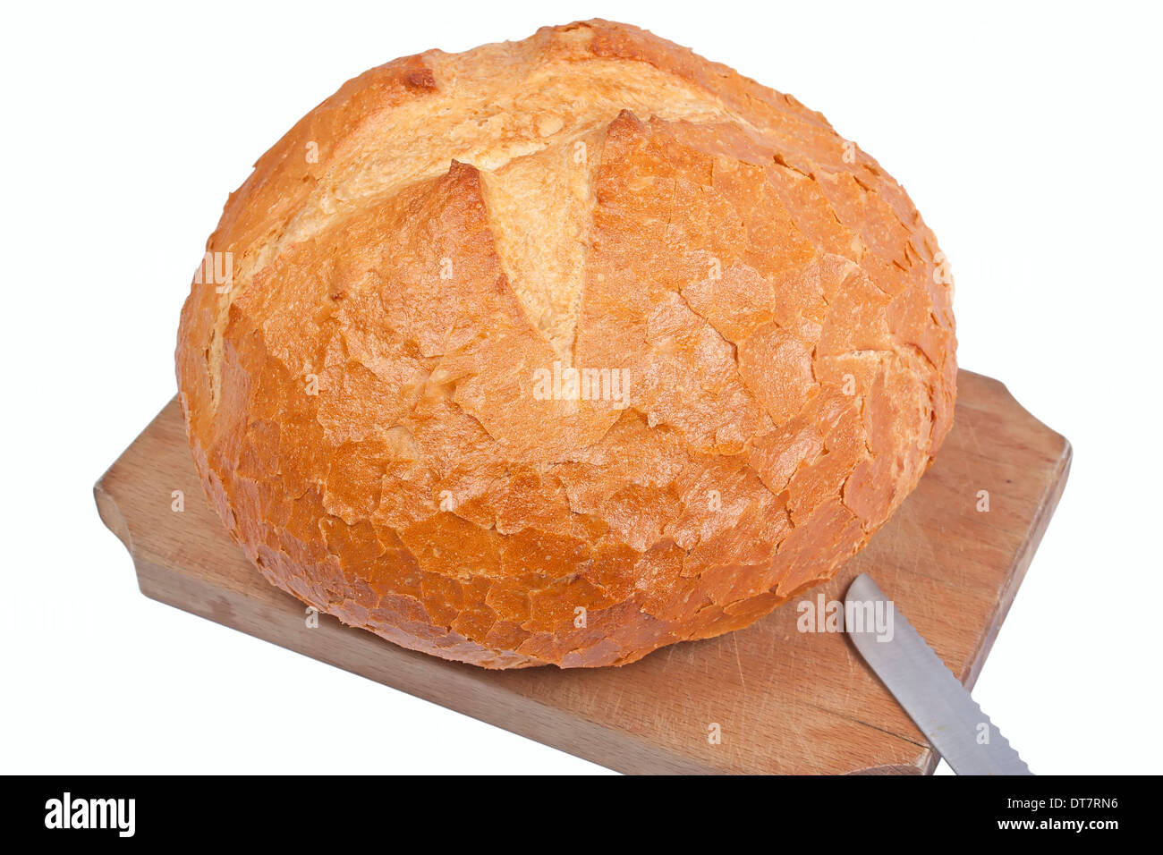 Round bread on wooden cutting board isolated on white Stock Photo