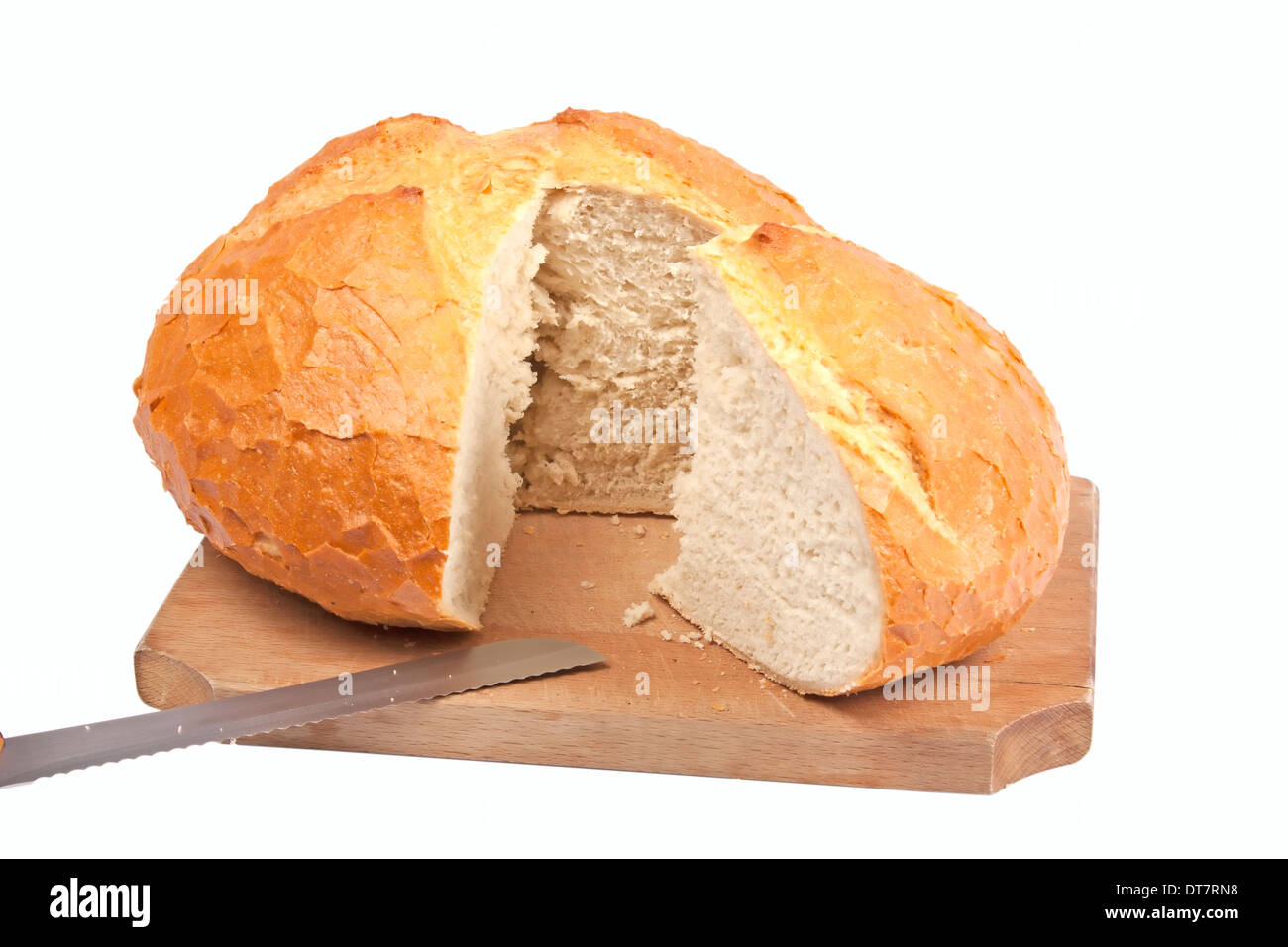 Round bread on wooden cutting board isolated on white Stock Photo
