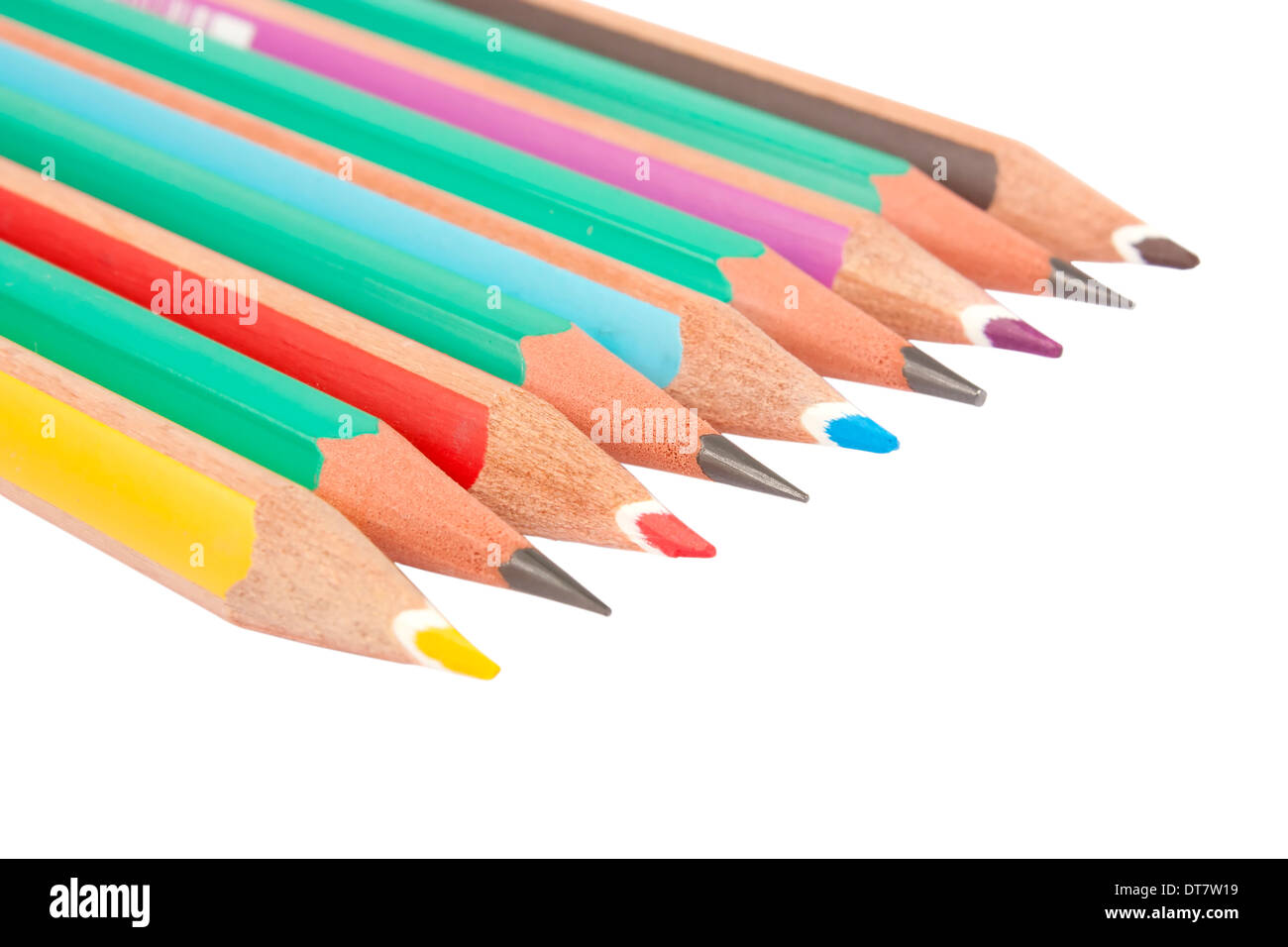 Color pencils mixed with gray pencils isolated on white background Stock Photo