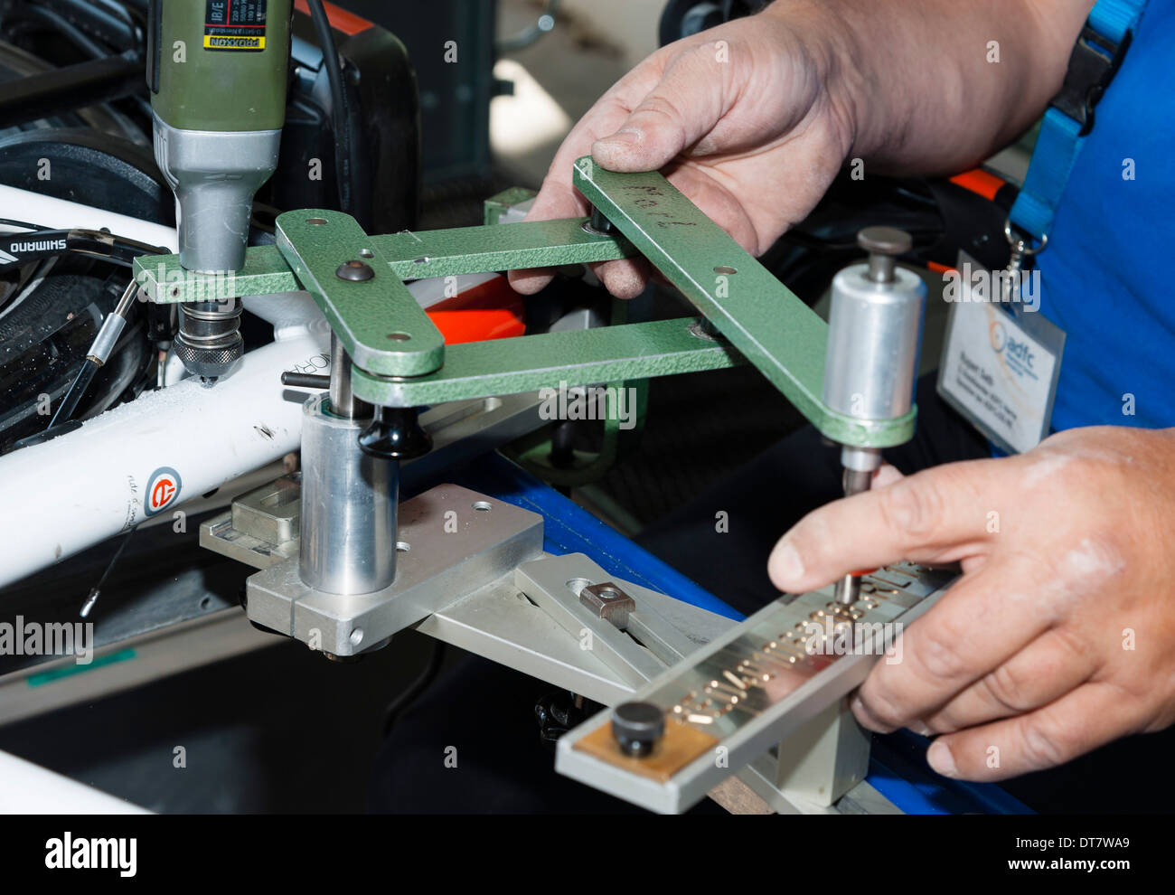 A technician of the ADFC bikers club  encodes a bike. Stock Photo