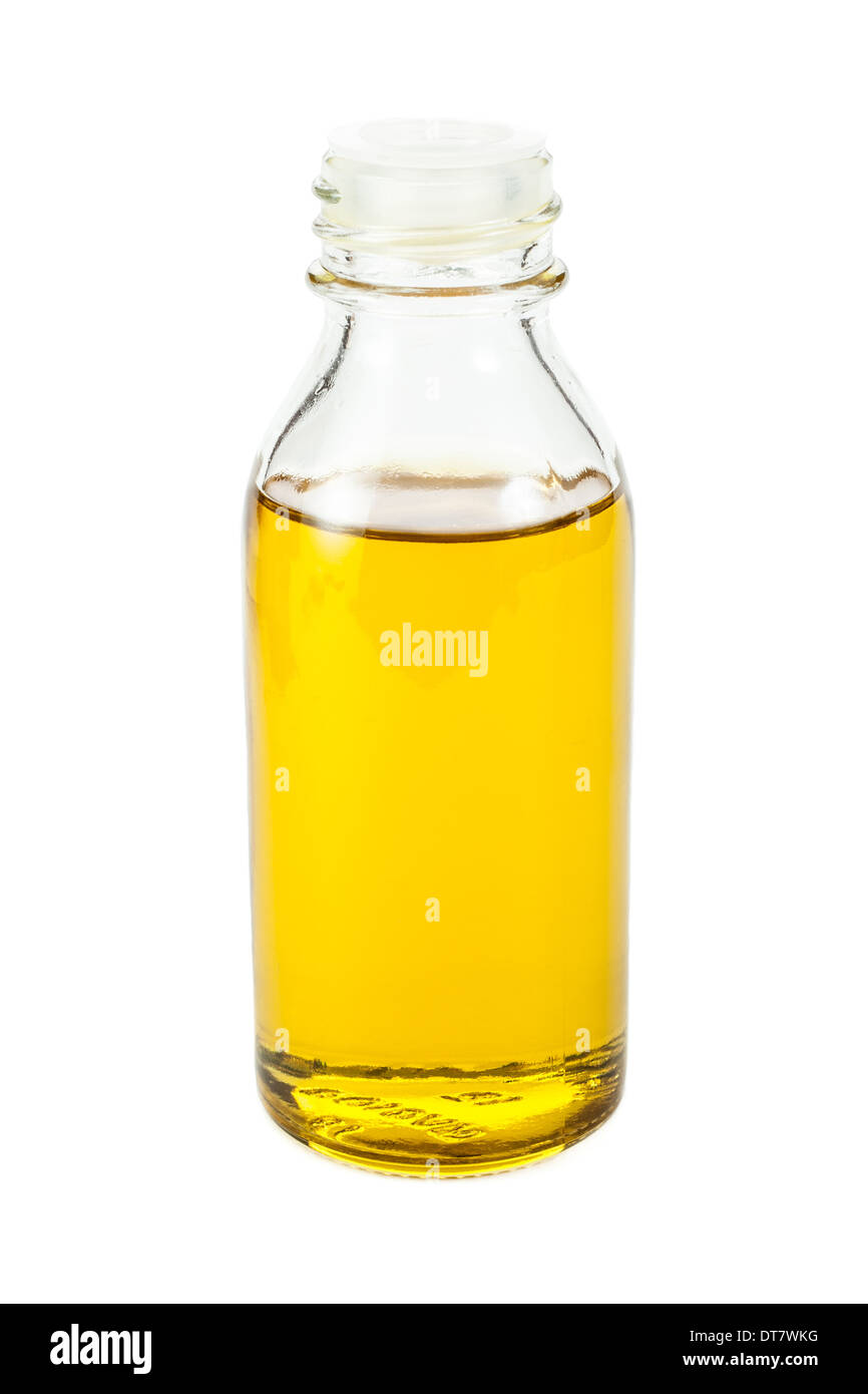 Linseed oil in small bottle isolated on white background Stock Photo