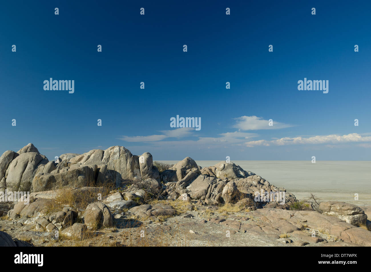 Granite outcrop of Kubu Island (Lekhubu), with the Magkadigkadi Pan stretching out behind, Botswana Stock Photo
