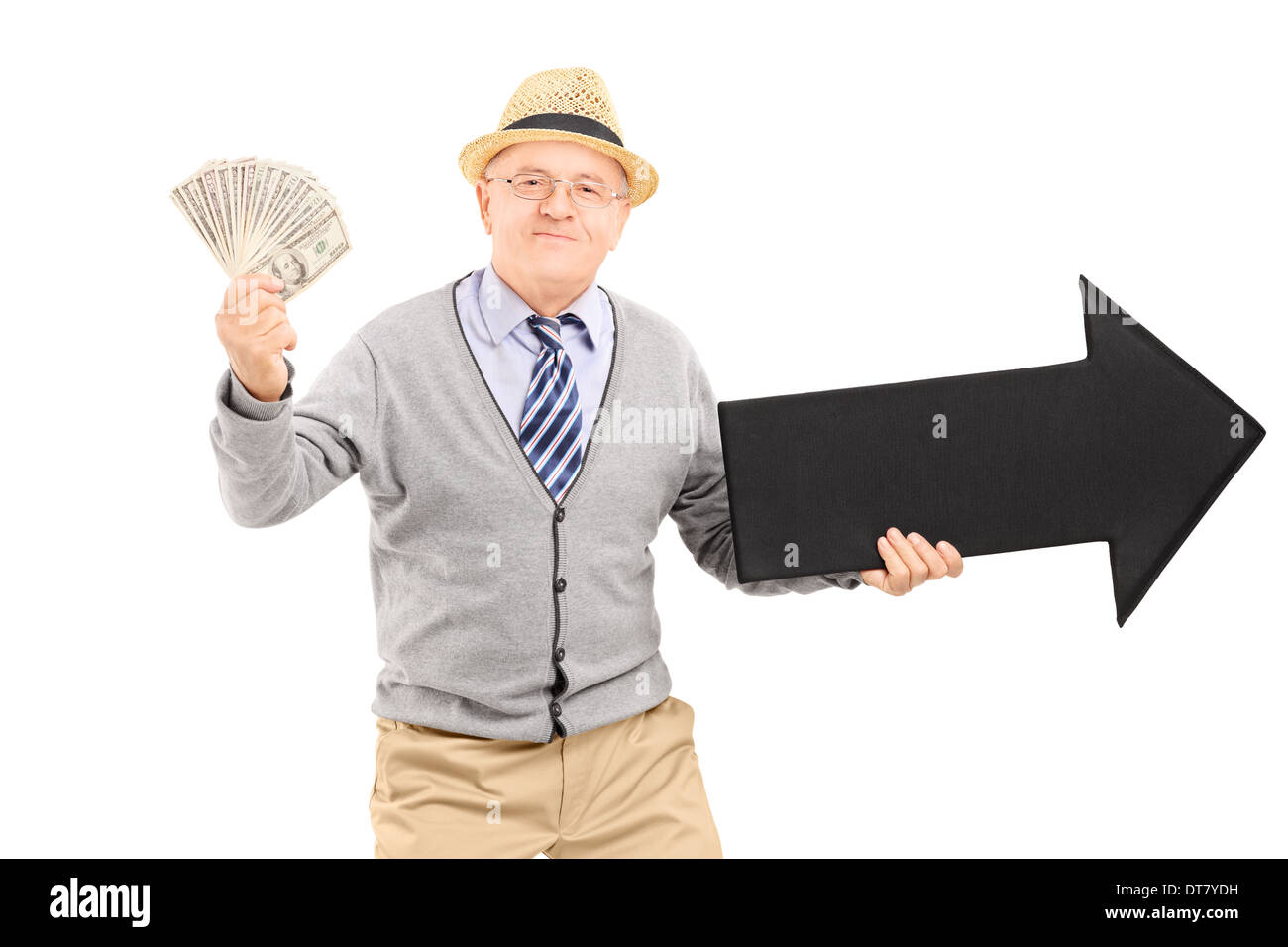 Senior adult holding money and a big black arrow pointing right Stock Photo