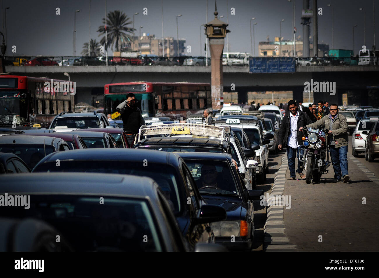 Cairo, Egypt. 10th Feb, 2014. In the last few years, Cairo traffic has become a major problem that is costing the country a significant amount of money and Cairenes their lives.According to a recent study by the World Bank titled, ''Cairo Traffic Congestion'' at least 4,000 Cairenes are injured and 1,000 Cairenes die each year in traffic related accidents, of which more than half are pedestrians. Credit:  ZUMA Press, Inc./Alamy Live News Stock Photo