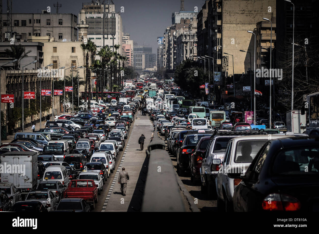 Cairo, Egypt. 10th Feb, 2014. In the last few years, Cairo traffic has become a major problem that is costing the country a significant amount of money and Cairenes their lives.According to a recent study by the World Bank titled, ''Cairo Traffic Congestion'' at least 4,000 Cairenes are injured and 1,000 Cairenes die each year in traffic related accidents, of which more than half are pedestrians. Credit:  ZUMA Press, Inc./Alamy Live News Stock Photo
