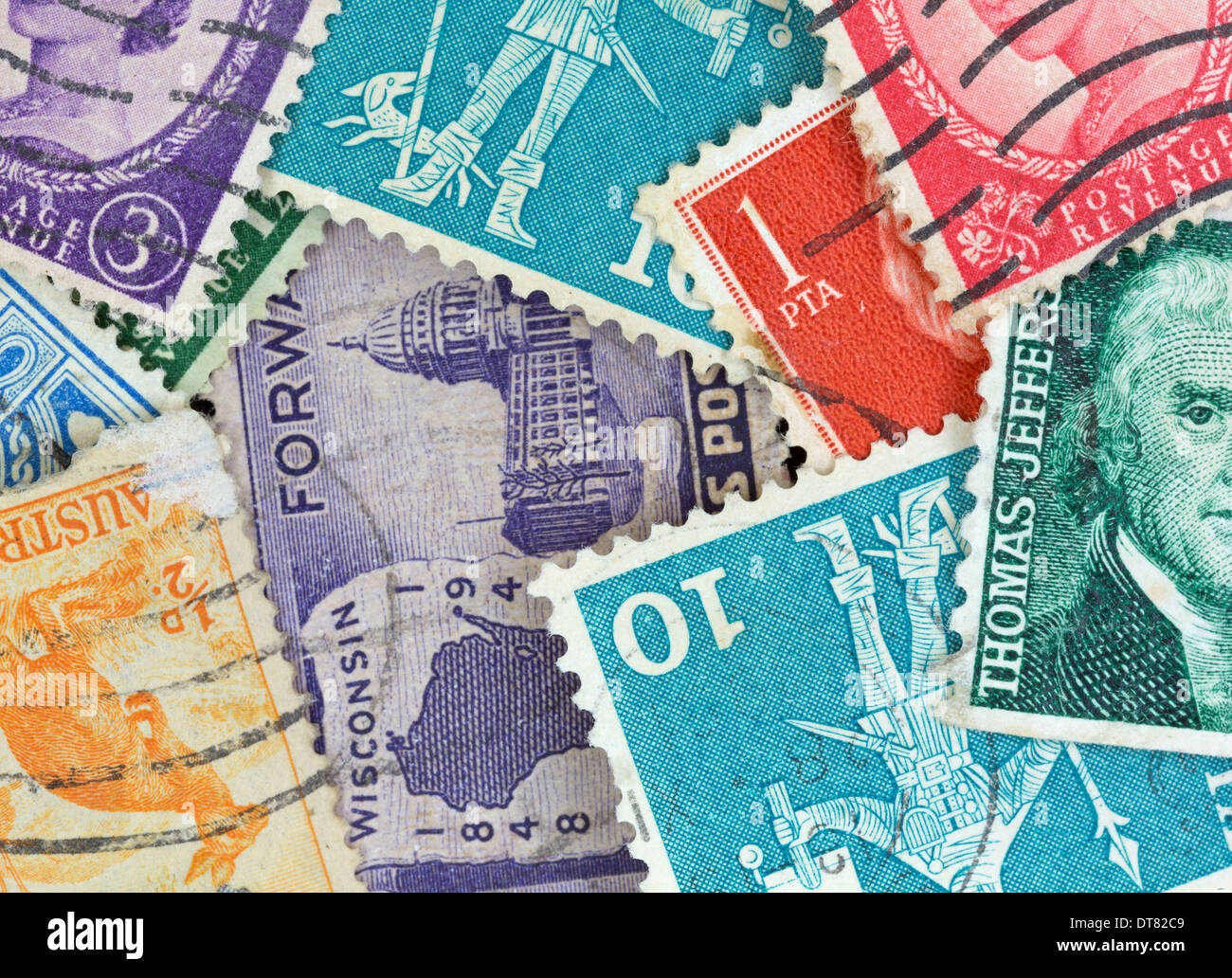 A very close view of several canceled vintage postage stamps Stock