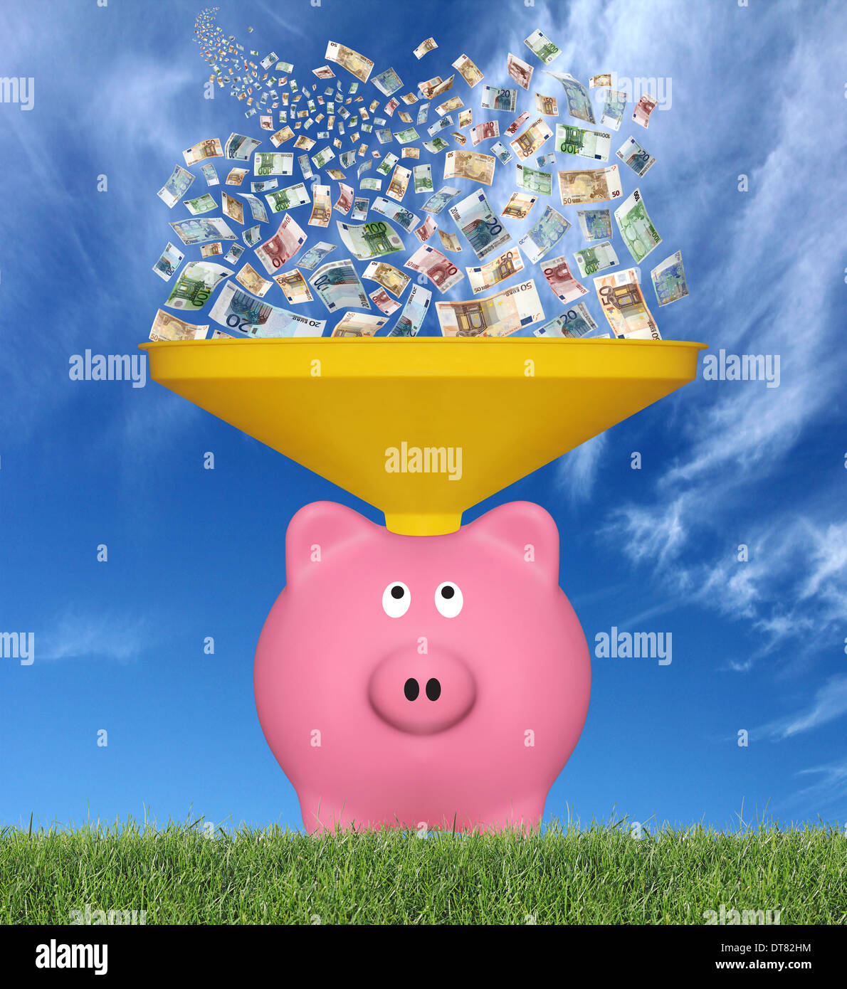 Many euro banknotes falling from the sky in a pink piggy bank Stock Photo