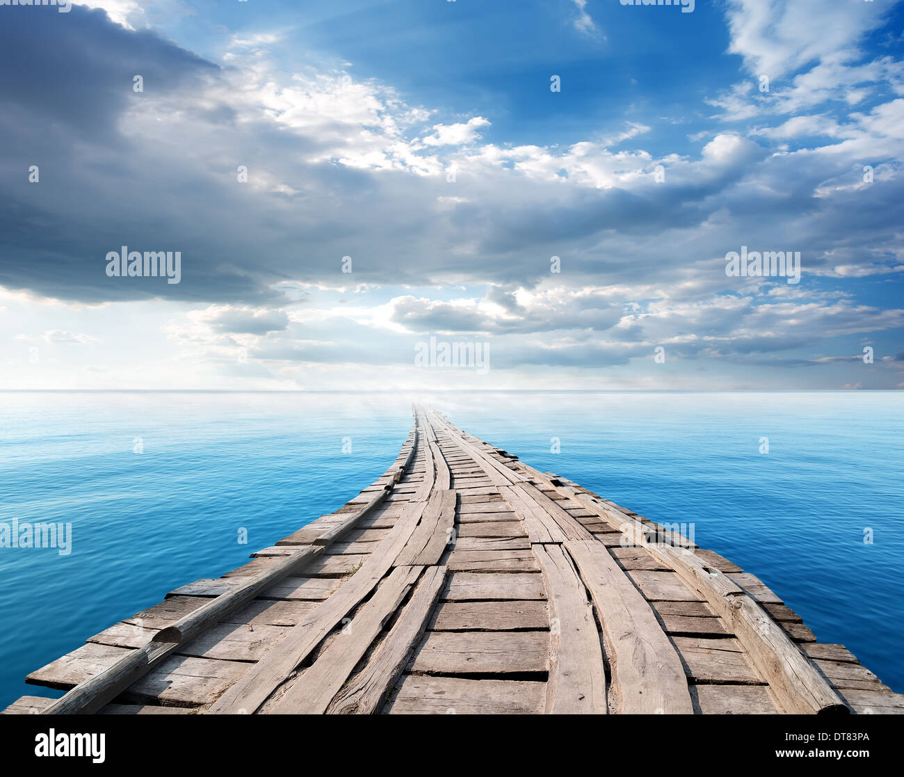 Bridge in the ocean against the sky Stock Photo