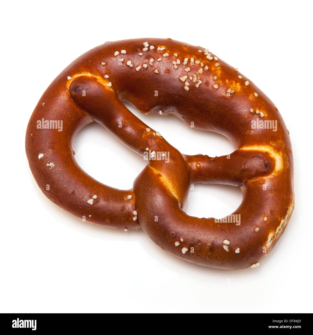 Rock salt pretzel isolated on a white studio background. Stock Photo