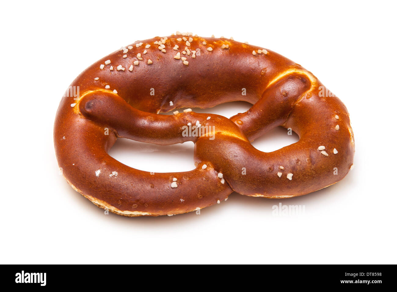 Rock salt pretzel isolated on a white studio background. Stock Photo
