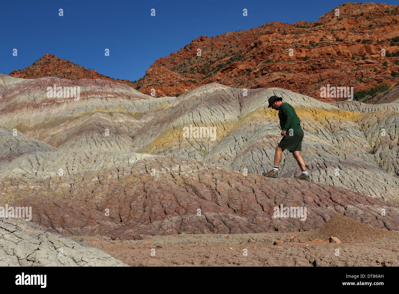 hiker Vermilion Cliffs National Monument Arizona, eroding rock Stock Photo