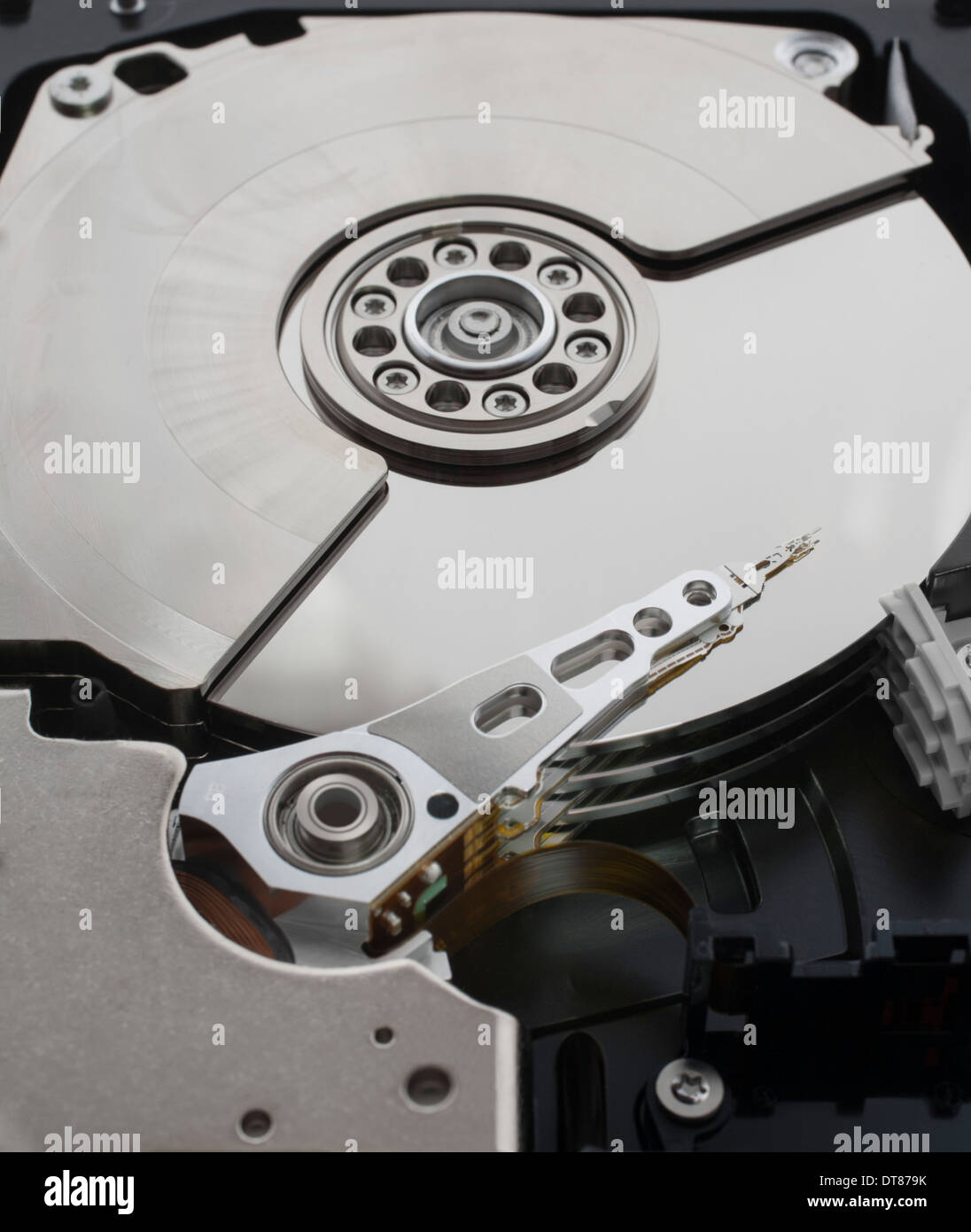 Close up of the internal mechanism of a computer hard disk drive. Stock Photo