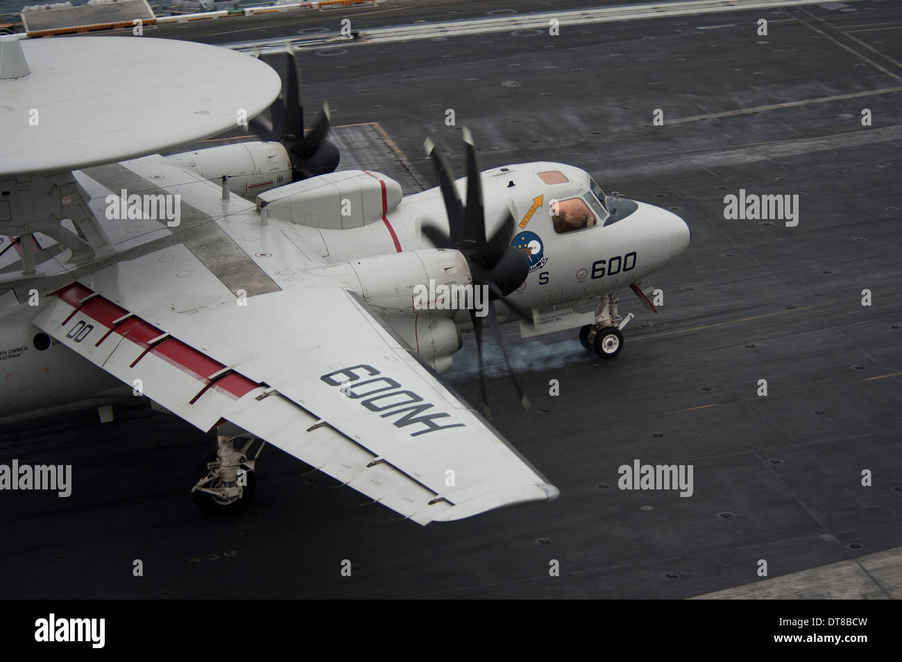 Gulf of Oman, July 15, 2013 - An E-2C Hawkeye lands on the flight deck of the aircraft carrier USS Nimitz. Stock Photo