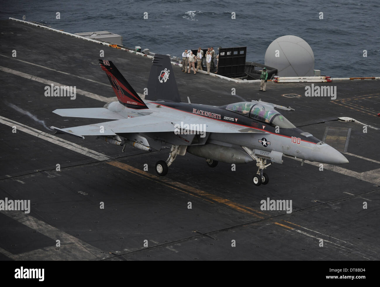 North Arabian Sea, July 16, 2013 - An F/A-18F Super Hornet lands on the flight deck of the aircraft carrier USS Nimitz. Stock Photo