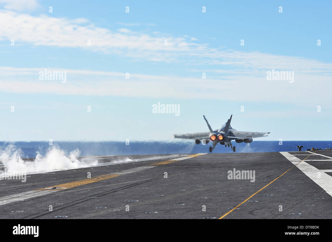 An F/A-18E Super Hornet launches from the flight deck of USS George Washington. Stock Photo