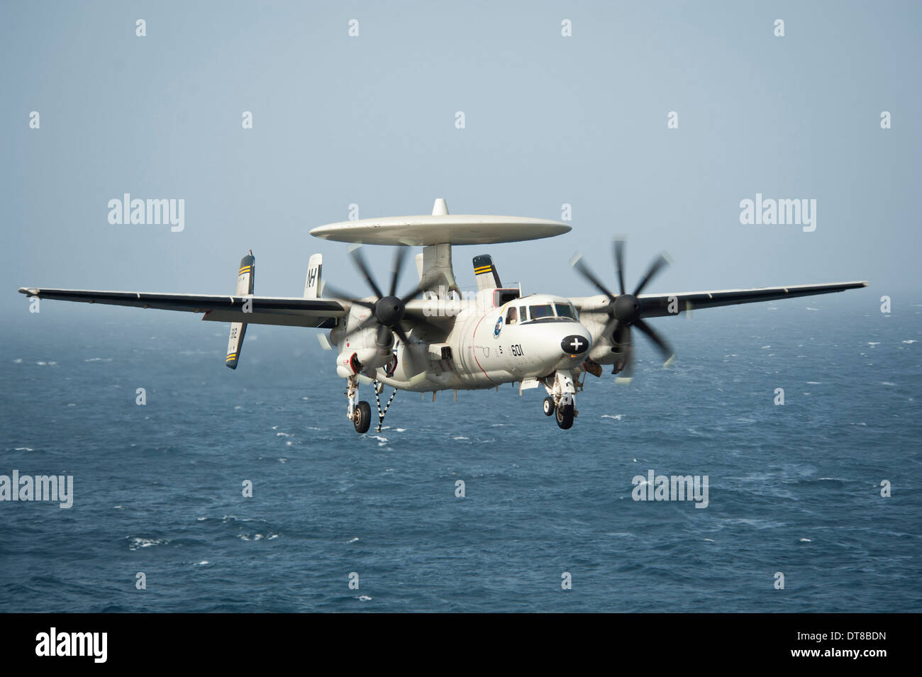 North Arabian Sea, July 22, 2013 - An E-2C Hawkeye prepares to land on the flight deck of the aircraft carrier USS Nimitz. Stock Photo