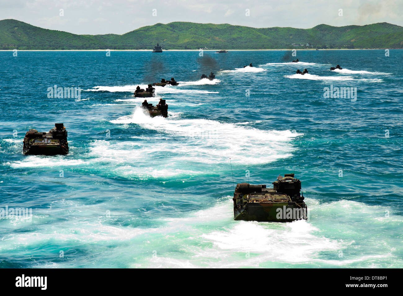 Amphibious assault vehicles approach Hat Yao beach, Thailand. Stock Photo