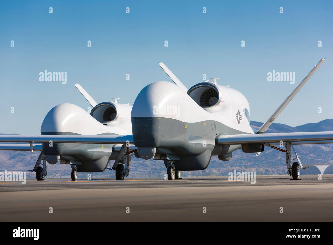 Two MQ-4C Triton unmanned aerial vehicles on the tarmac. Stock Photo