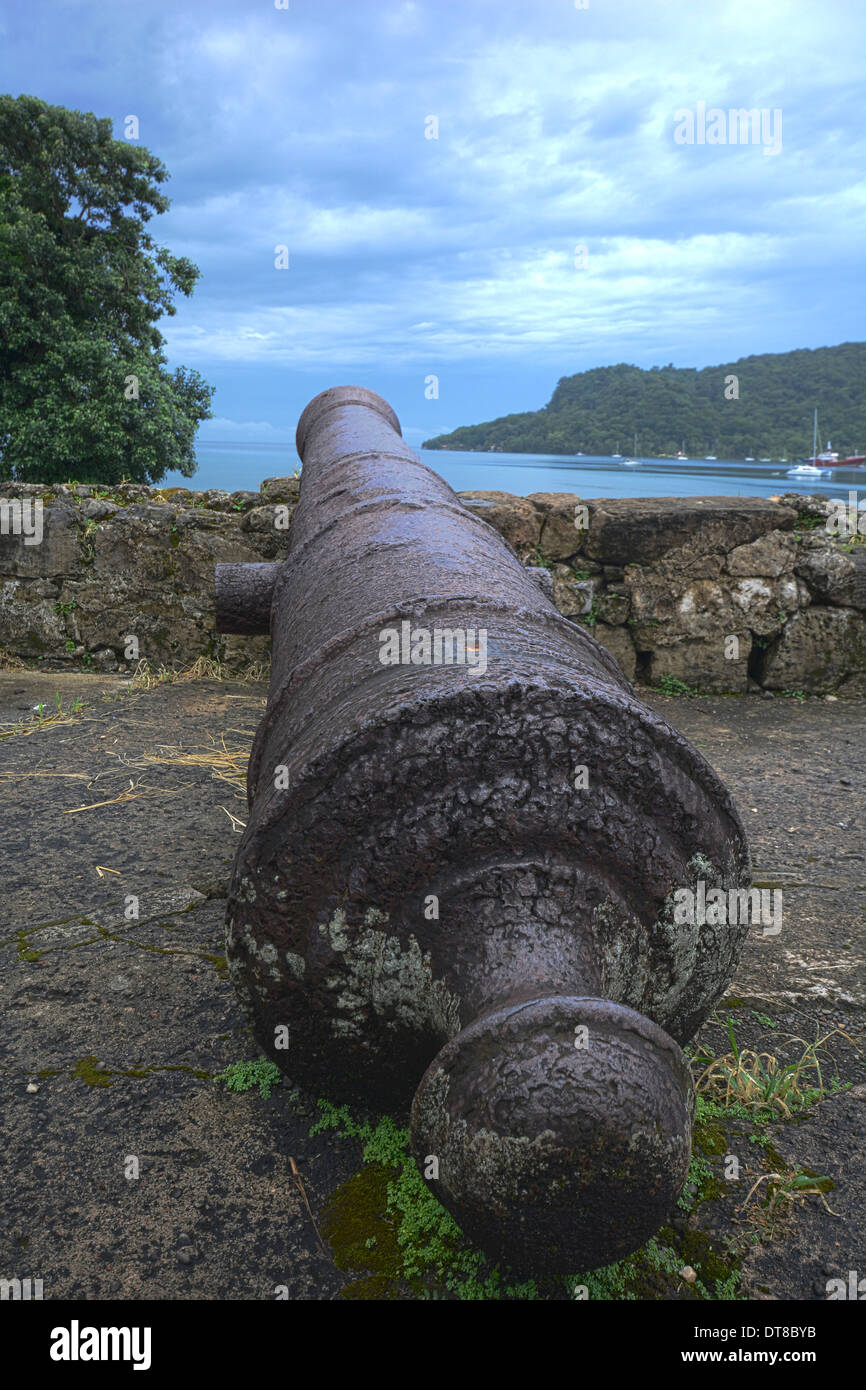 VErtical shot of an old Spanish colonial cannon at Portobelo, Panama Stock Photo