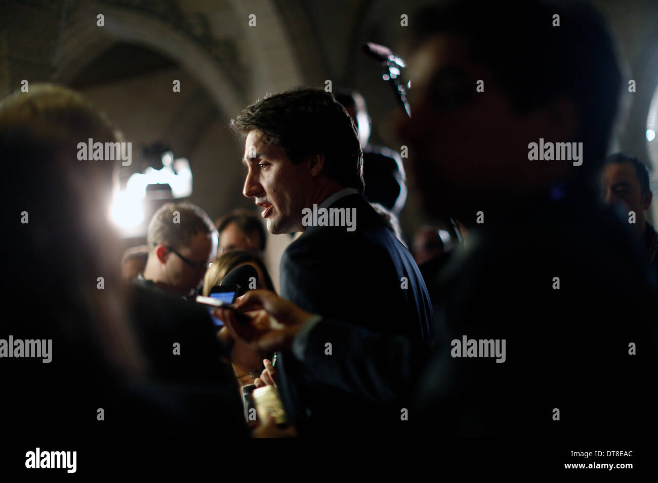 Ottawa, Canada. 11th Feb, 2014. Liberal Party leader Justin Tudeau speaks to reporters about the new federal budget, unveiled by Finance Minister Jim Flaherty at Parliament Hill in Ottawa, Canada, Feb. 11, 2014. Jim Flaherty on Tuesday unveiled a federal budget projecting a surplus in 2015. © David Kawai/Xinhua/Alamy Live News Stock Photo