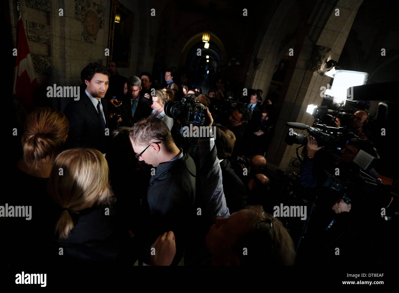 Ottawa, Canada. 11th Feb, 2014. Liberal Party leader Justin Tudeau speaks to reporters about the new federal budget, unveiled by Finance Minister Jim Flaherty at Parliament Hill in Ottawa, Canada, Feb. 11, 2014. Jim Flaherty on Tuesday unveiled a federal budget projecting a surplus in 2015. © David Kawai/Xinhua/Alamy Live News Stock Photo