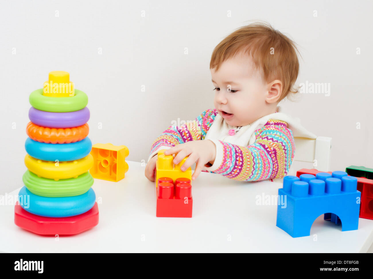 little child playing with with toys Stock Photo - Alamy