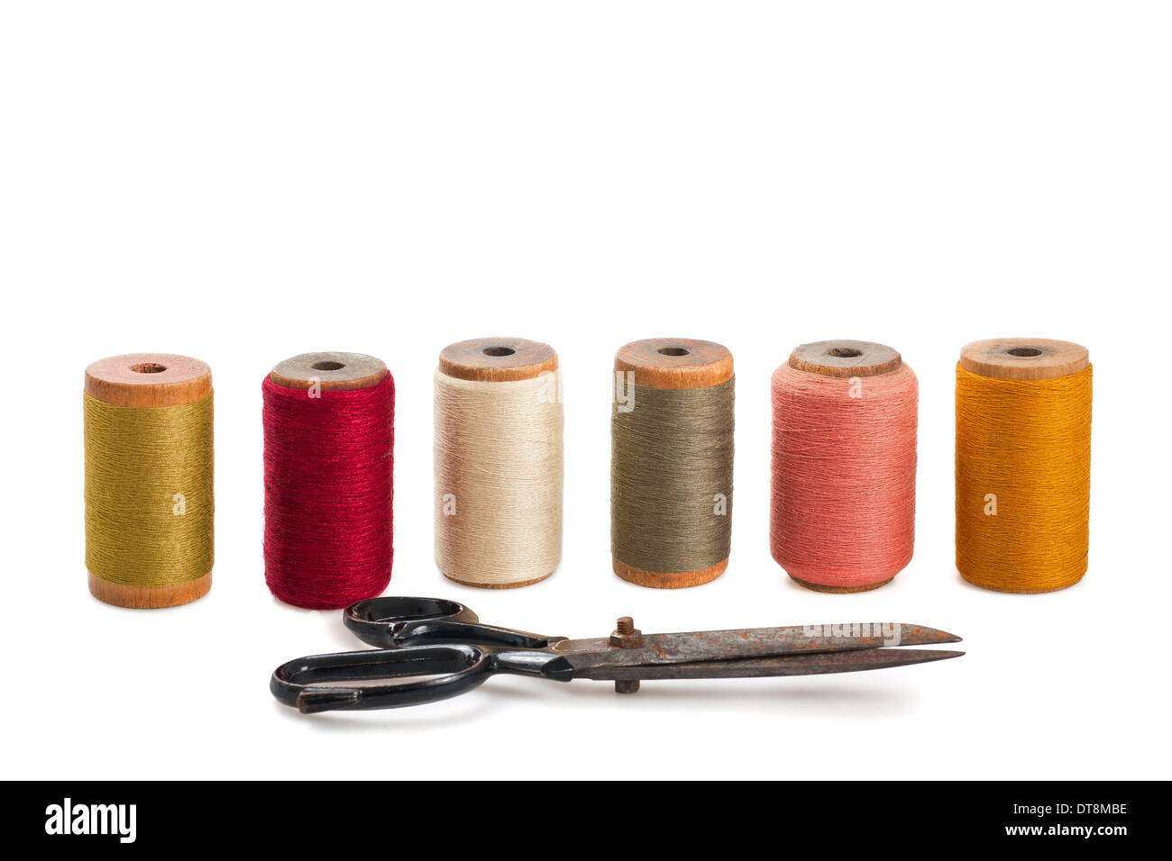 Scissors and spools isolated on white Stock Photo