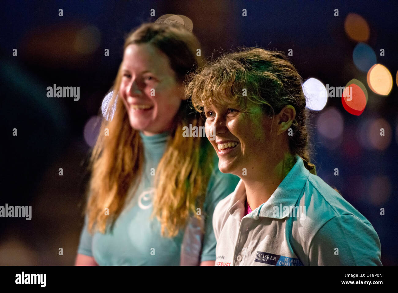 Elizabeth Beaucamp (left) and Jane McIntosh (right) smile as they disembark the MV Hedvig Bulker after being rescued when their rudder malfunctioned February 3, 2014 in the Port of Beaumont, TX. Stock Photo