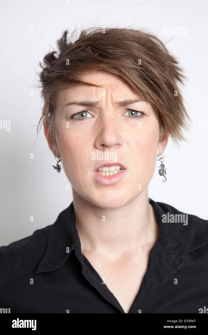 Short Haired Girl Headshot Expression Stock Photo