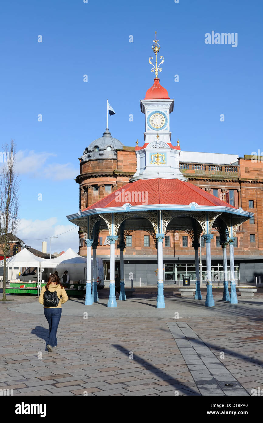 The 'Brigton Umbrella', a Victorian cast iron shelter and clocktower made by George Smith in 1874, Bridgeton Cross, Glasgow, Scotland. Stock Photo