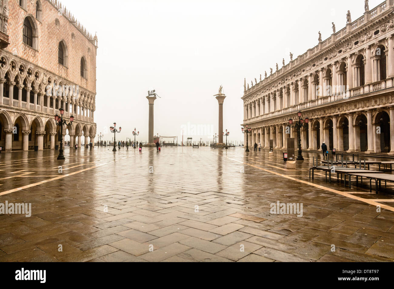 Venice, Italy. Piazzetta San Marco, St Mark´s Square on a rainy overcast day with reflections in the pavement. Stock Photo