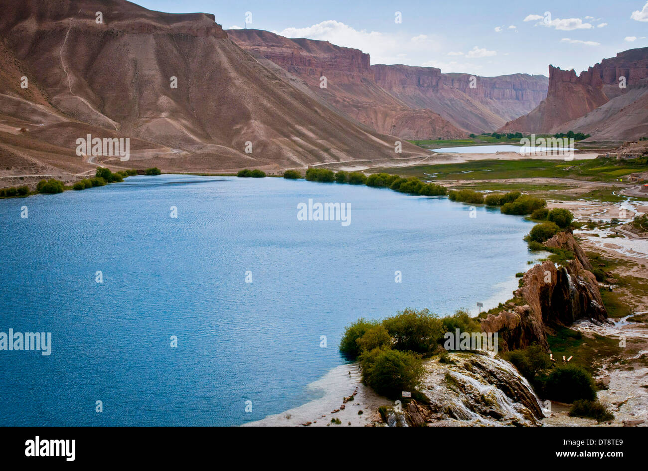 View of the lakes at the Band-e-Amir National Park June 27, 2012 in Bamyan, Afghanistan. The lakes were created by natural dams of travertine and is known as Afghanistan's Grand Canyon. Stock Photo