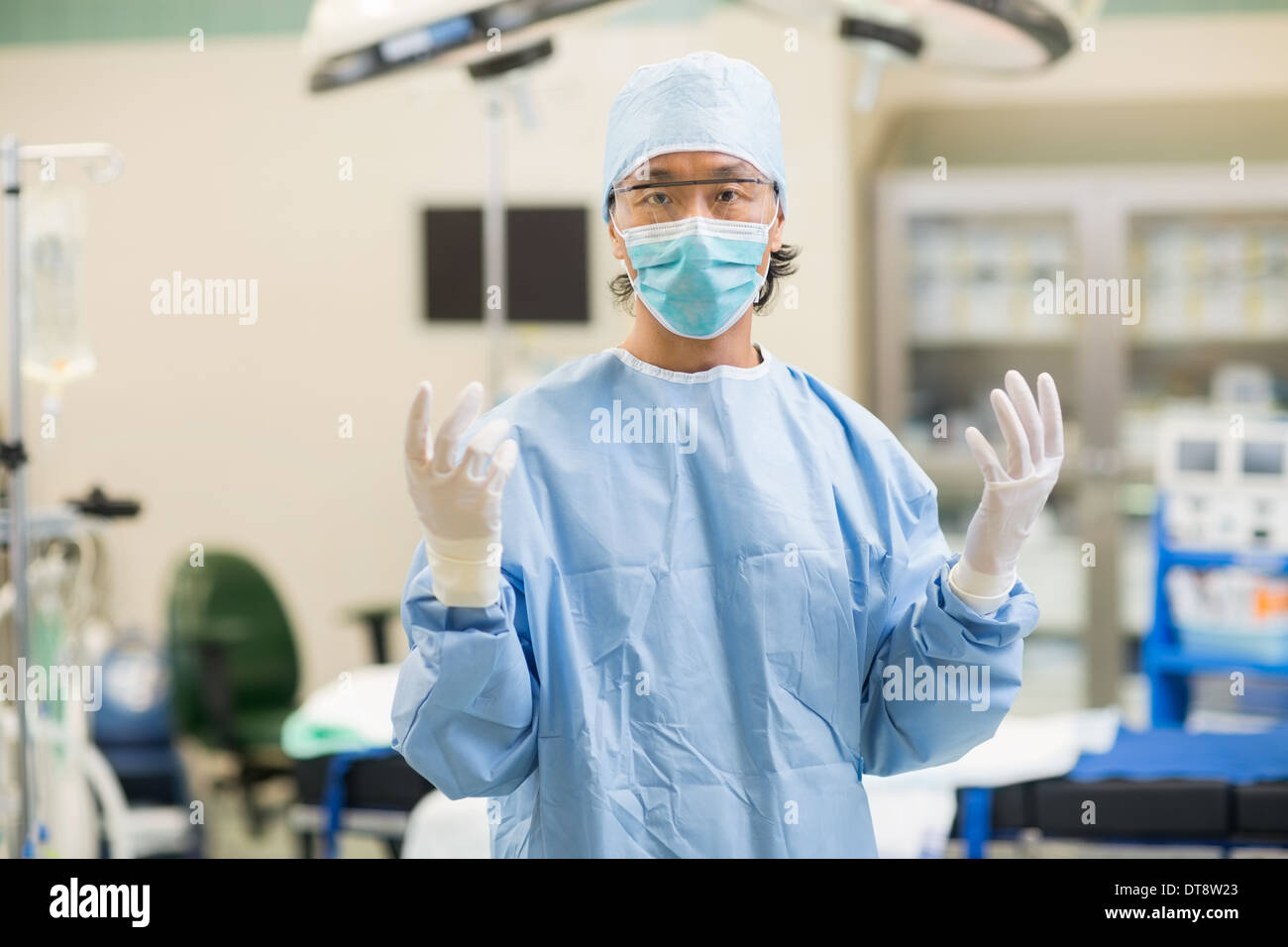 Doctor In Surgical Gown in Operation Room Stock Photo