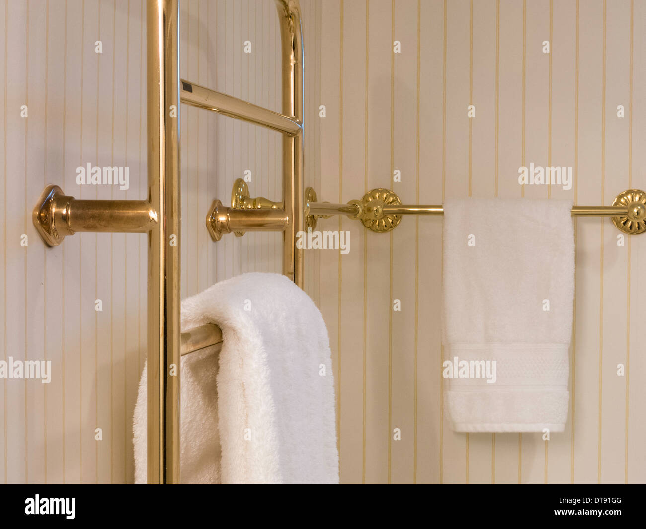 Towels on Residential Bathroom Towel Warmer and Rack, USA Stock Photo