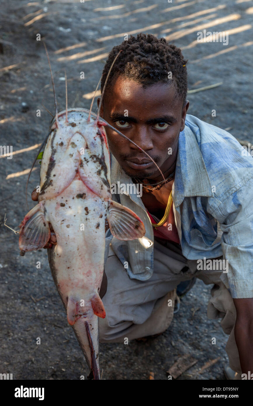 Boy With Fish, The Fish Market, Lake Hawassa, Hawassa, Ethiopia Stock Photo  - Alamy