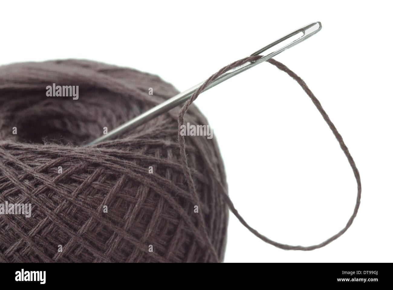 tucked into the needle thread Stock Photo Alamy