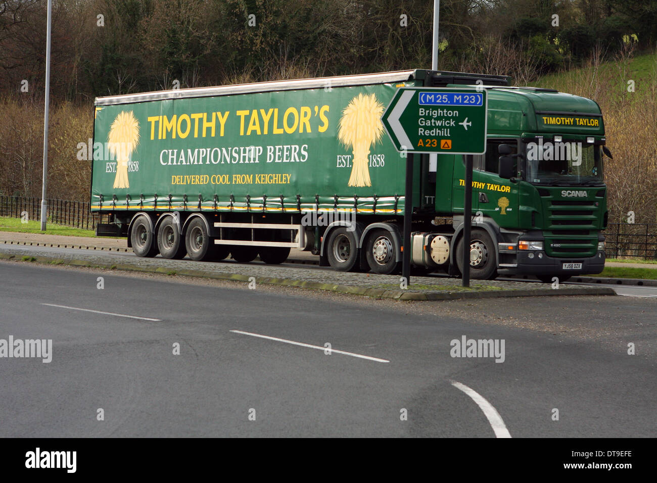 A truck traveling along a road in Coulsdon, Surrey, England Stock Photo