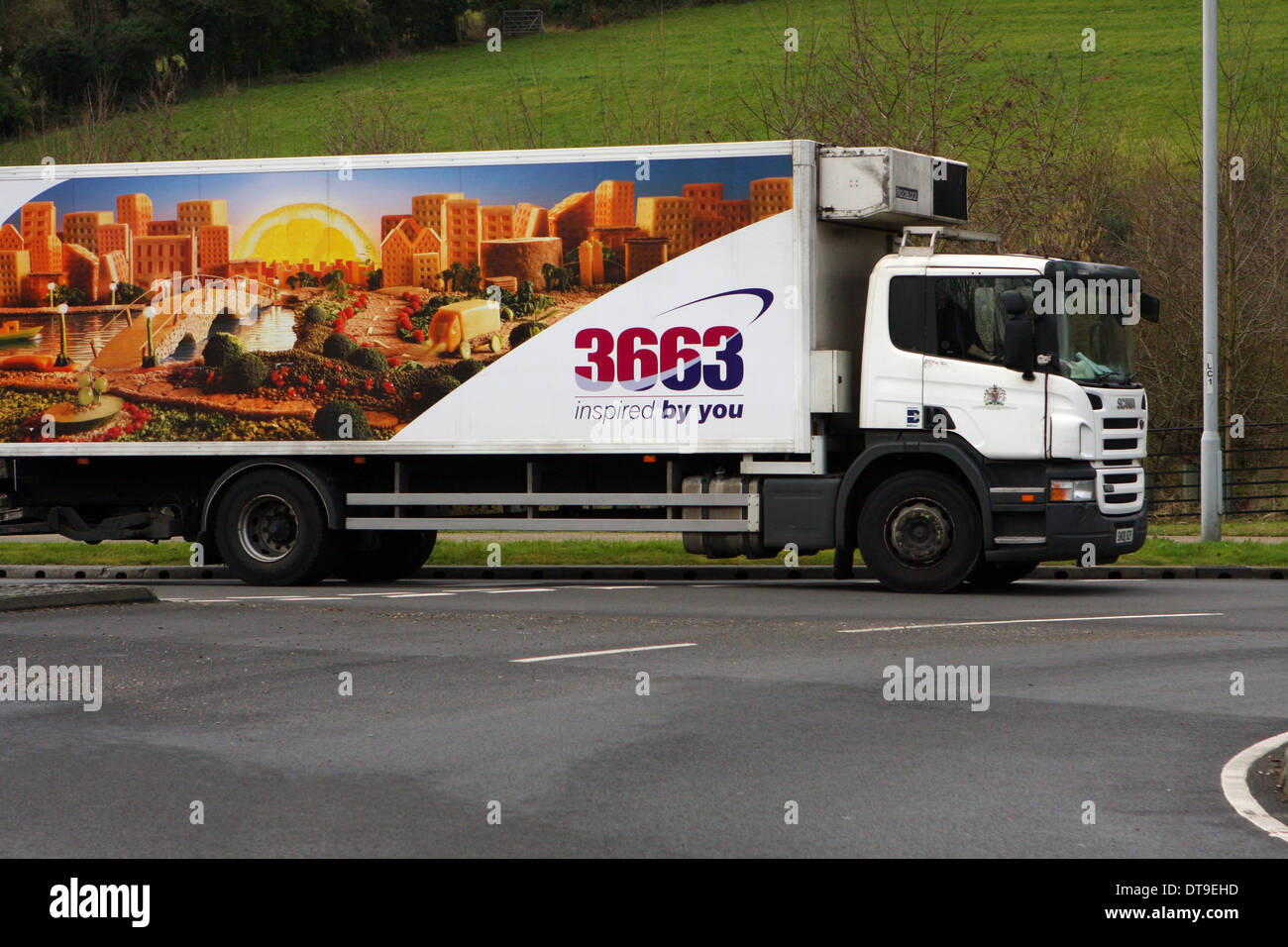 A truck entering a roundabout in Coulsdon, Surrey, England Stock Photo