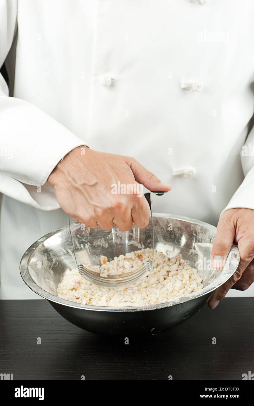 Close-up of a pastry chef preparing a crust Stock Photo