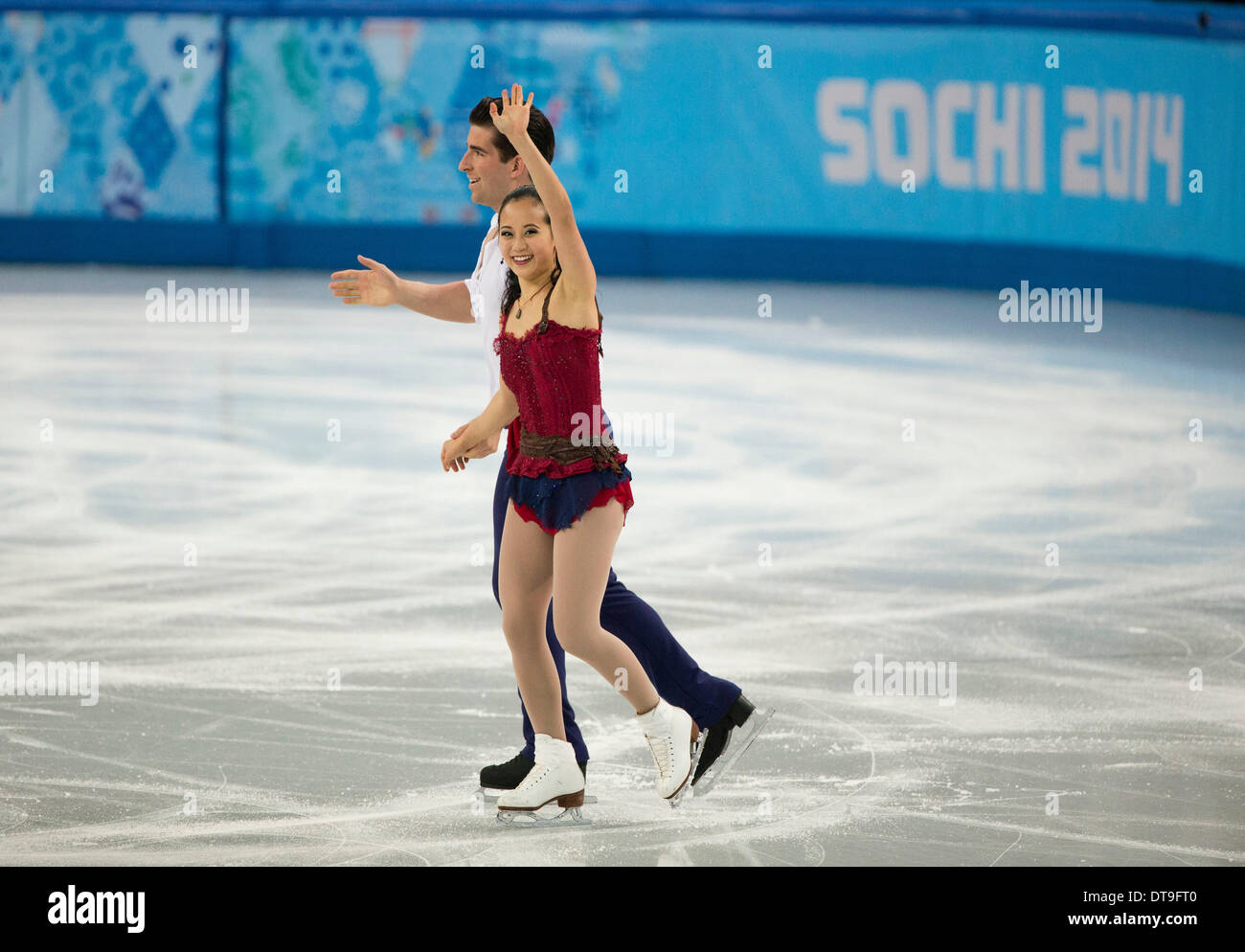 Sochi, Russia. 12th Feb, 2014. United States's Felicia Zhang and Nathan Bartholomay wave to audience after their routine during Team Pairs Free Skating at Iceberg Skating Palace during the 2014 Winter Olympics in Sochi. Credit:  Paul Kitagaki Jr./ZUMAPRESS.com/Alamy Live News Stock Photo
