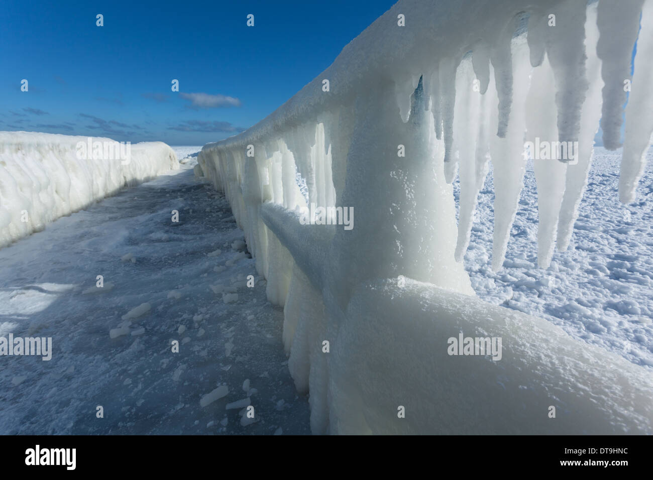 pier railing icicles closeup perspective Stock Photo