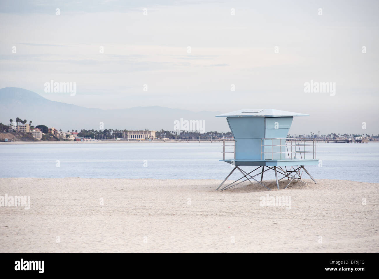 Life guard station on beach with calm ocean. Stock Photo