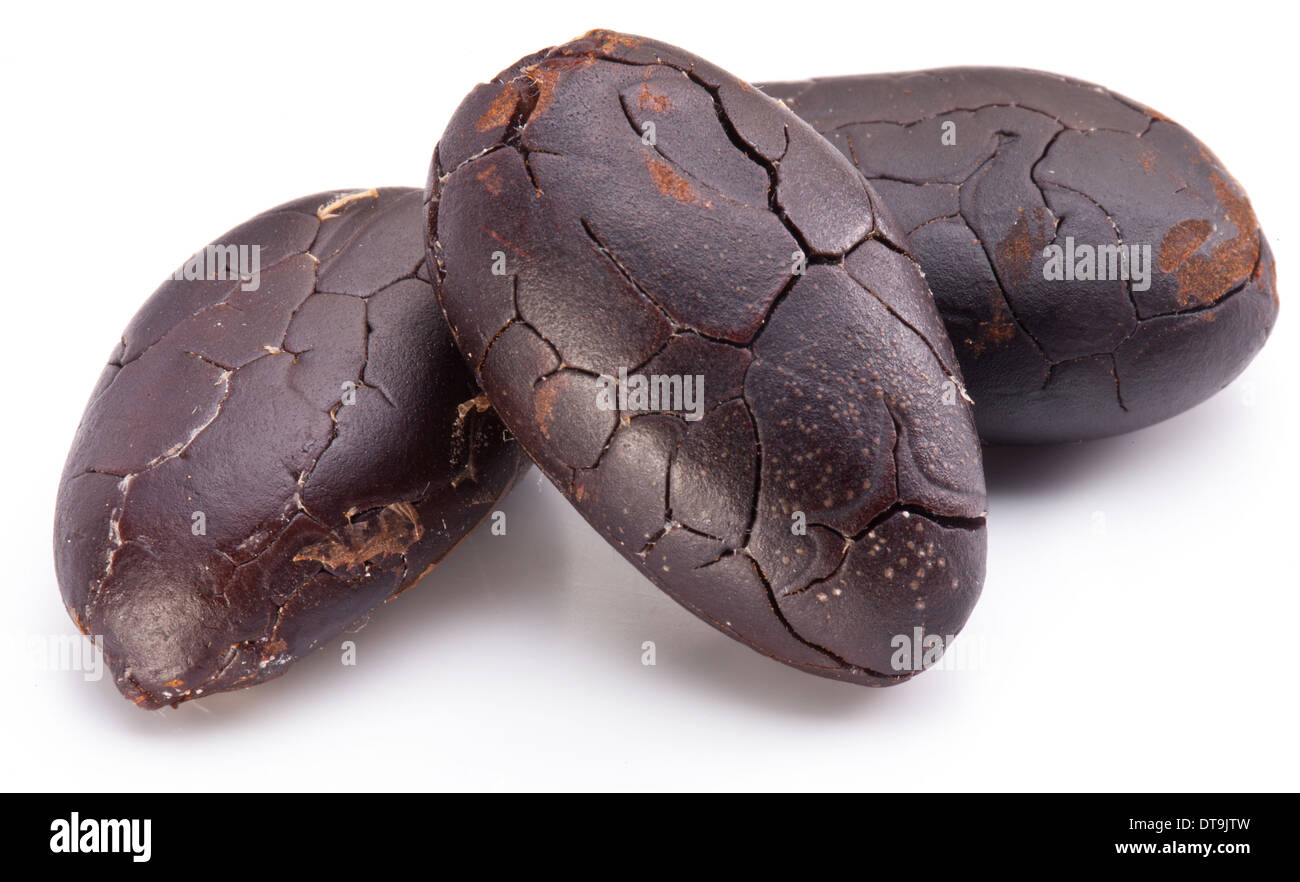 Cocoa beans on a white background. Stock Photo