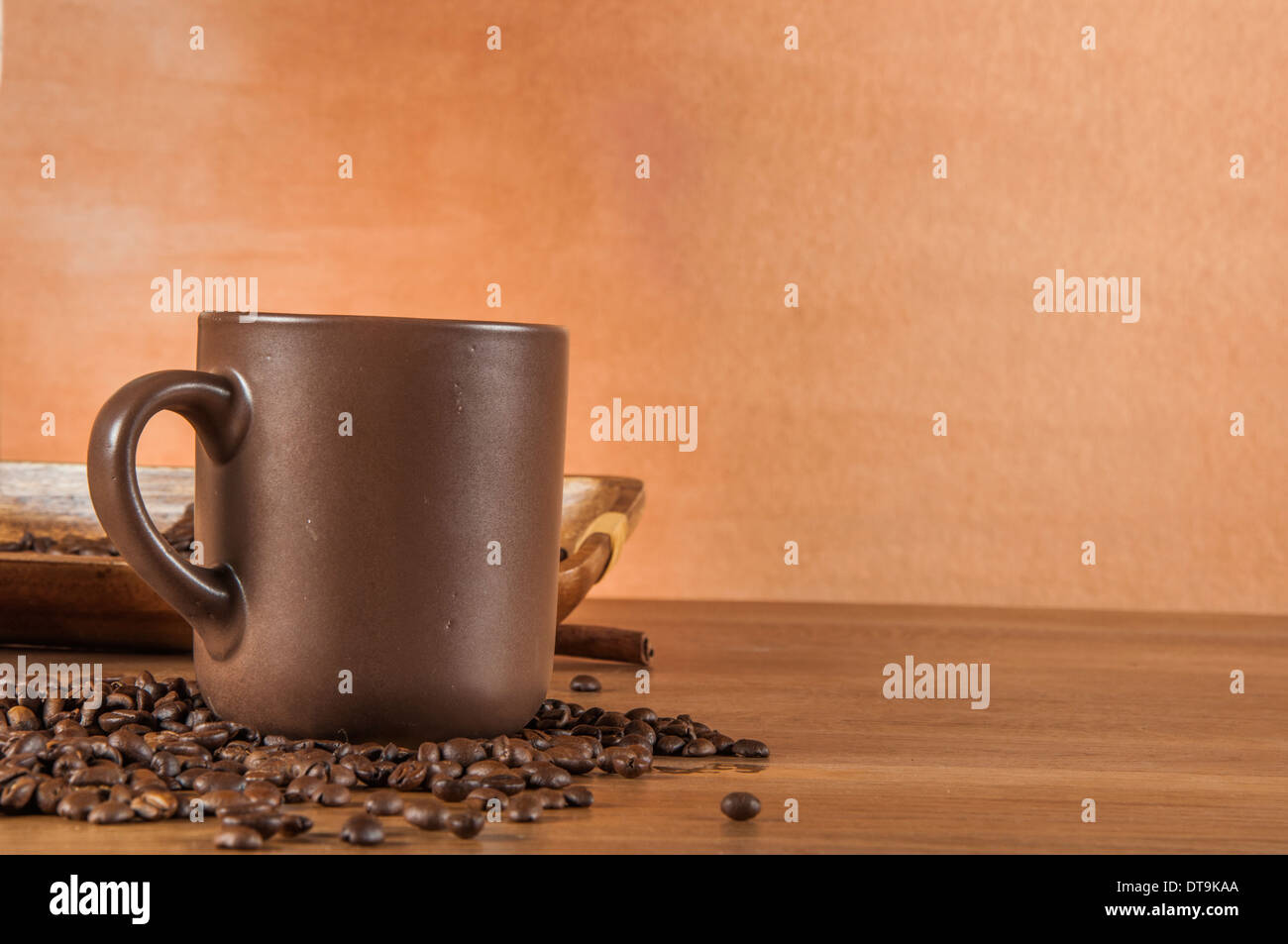 Coffee theme with wooden table and dark background Stock Photo - Alamy