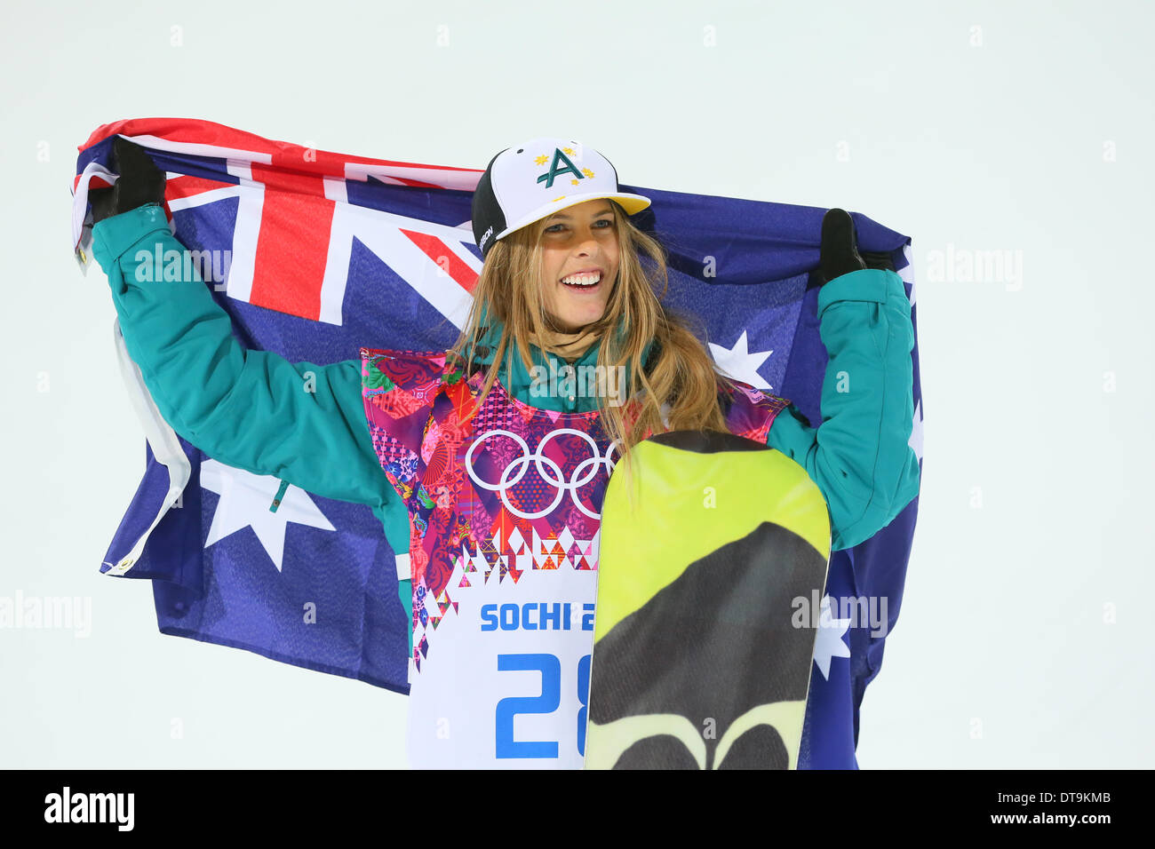 Torah Bright (AUS) waves the Australian flag as she celebrates winning the silver medal in the women's halfpipe at the Sochi 2014 Winter Olympic Games. (Photo Yutaka/AFLO) Stock Photo