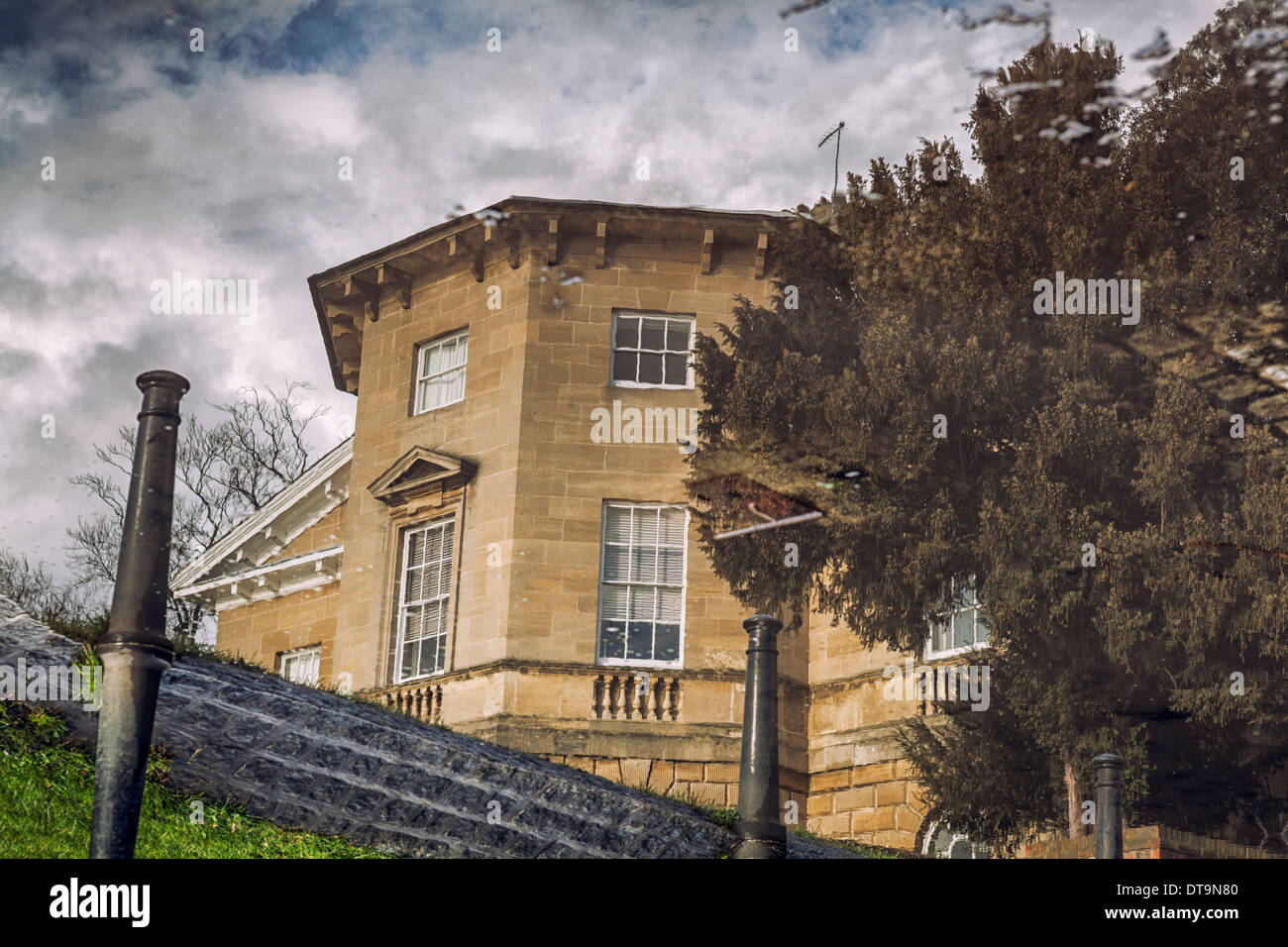 Asgill House reflected in the flooded road during high tide.Old Palace Road,Richmond River side,Richmond-Upon-Thames,England Stock Photo