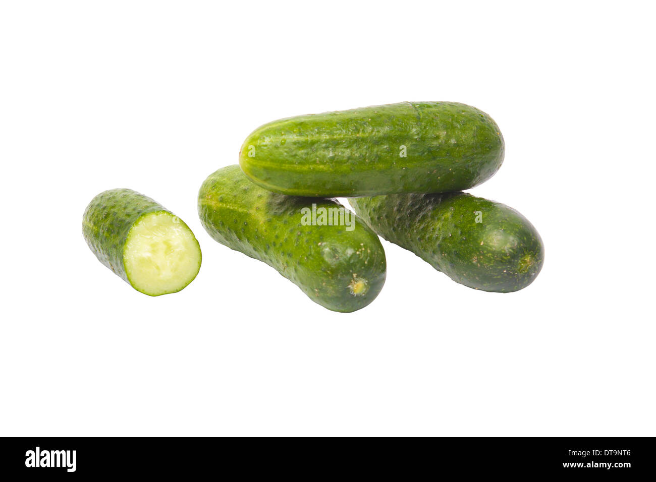 Four fresh cucumbers isolated on a white background Stock Photo